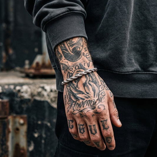 6mm silver rope bracelet on a tattooed men's wrist