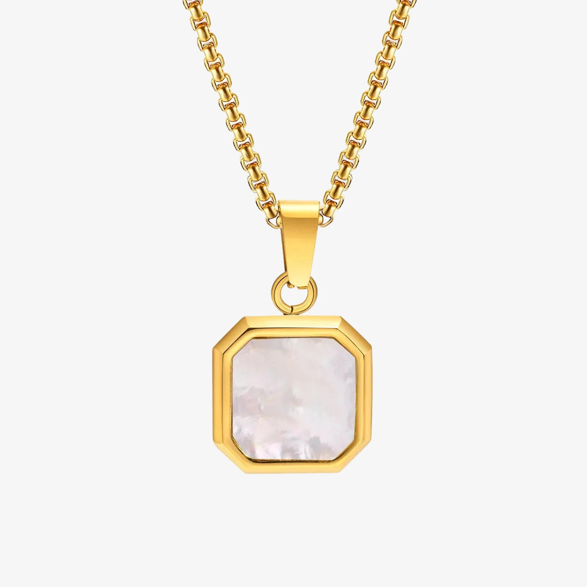 Gold necklace with a hexagonal pendant on a white background