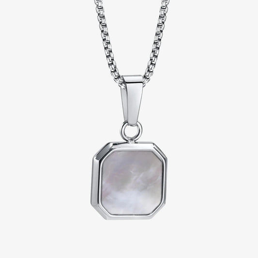 Silver necklace with a hexagonal pendant on a white background