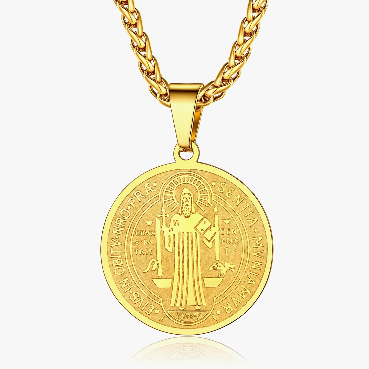 A gold Saint Tammany pendant necklace on a matching gold curb chain, shown against a light gray background with a subtle reflection.