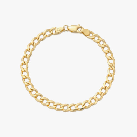 A gold-toned Cuban link chain bracelet with a lobster clasp, shown on a clean white background.