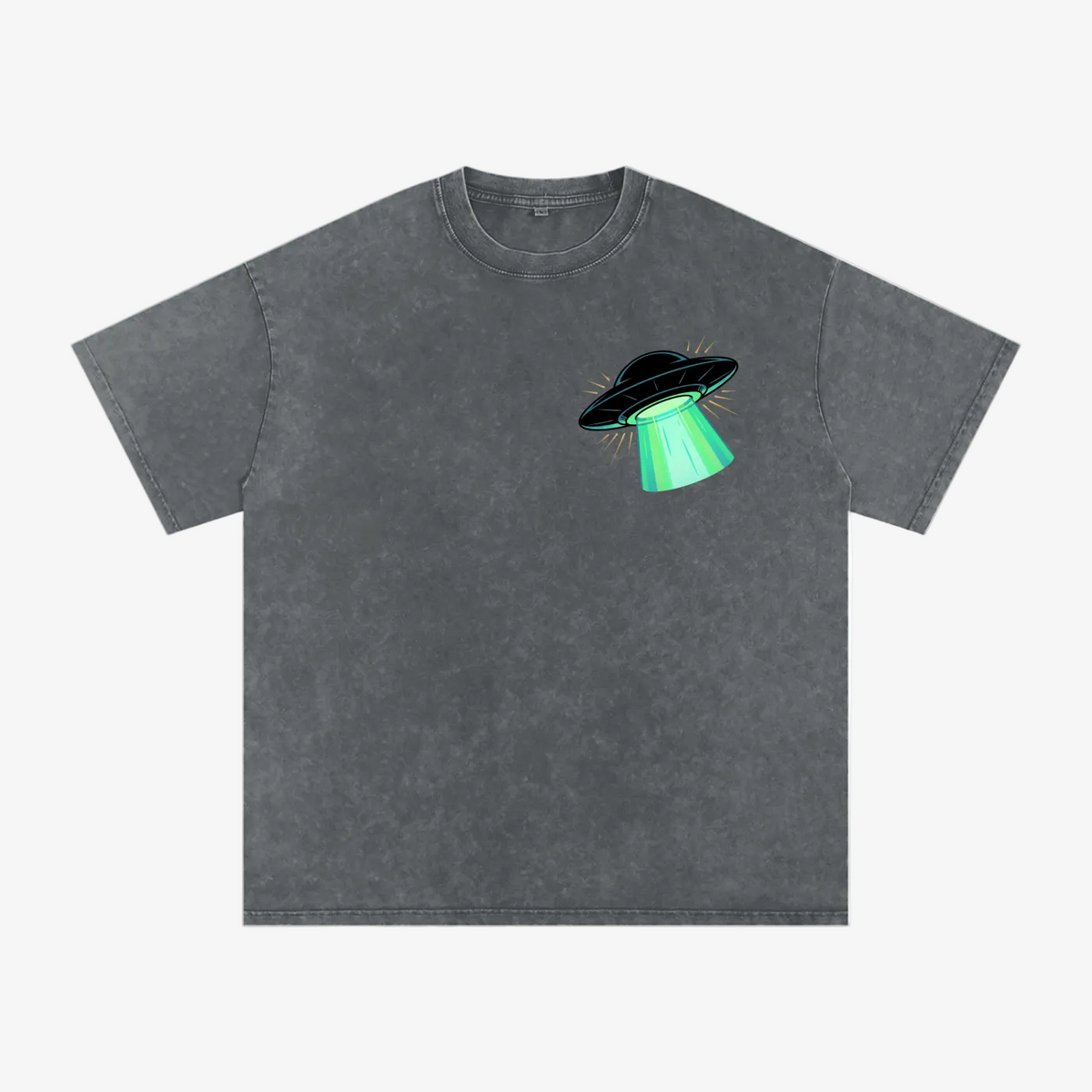 A dark gray mineral-wash t-shirt with a small chest graphic of a black flying saucer emitting a bright green beam of light, shown on a plain white background.